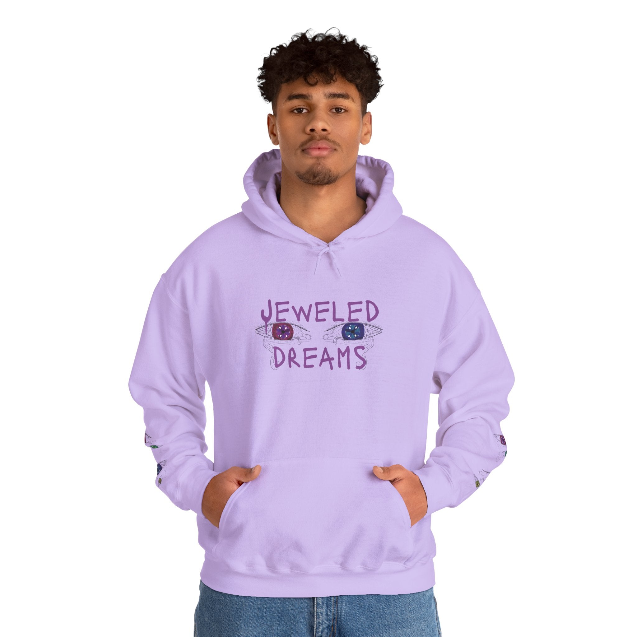 Person wearing a lavender hoodie with 'Jeweled Dreams' text on a white background