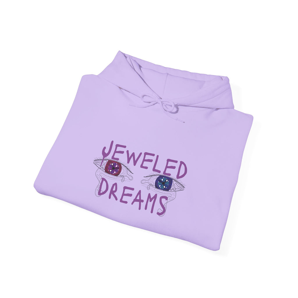 Folded light purple hoodie with 'Jeweled Dreams' text and eye designs on a white background