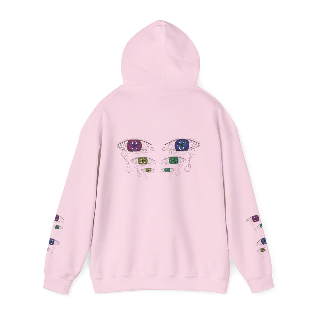 Pink hoodie with decorative eyes on the back against a white background